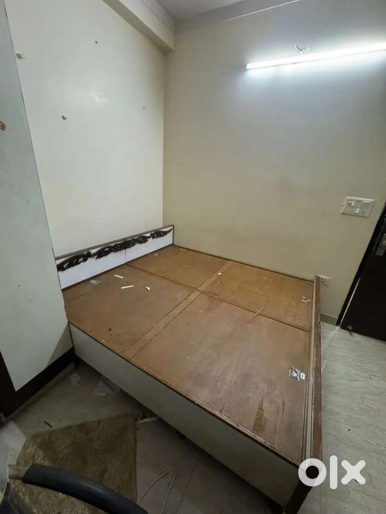 Wooden bed with bed box