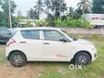 Maruti Suzuki Swift LXI Optional-O, 2016, Petrol