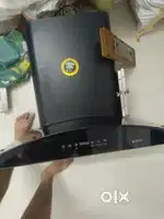 An electric chimney , well modified condition with bill, touch screen