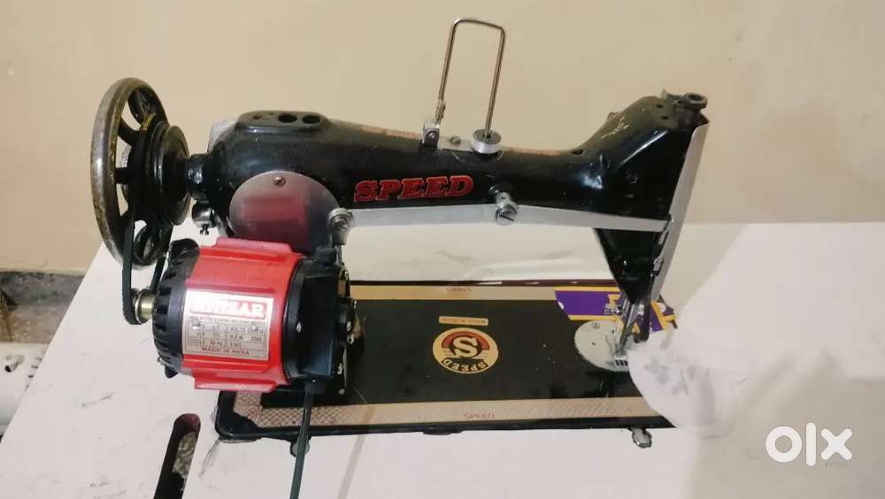 Sewing machine with moter