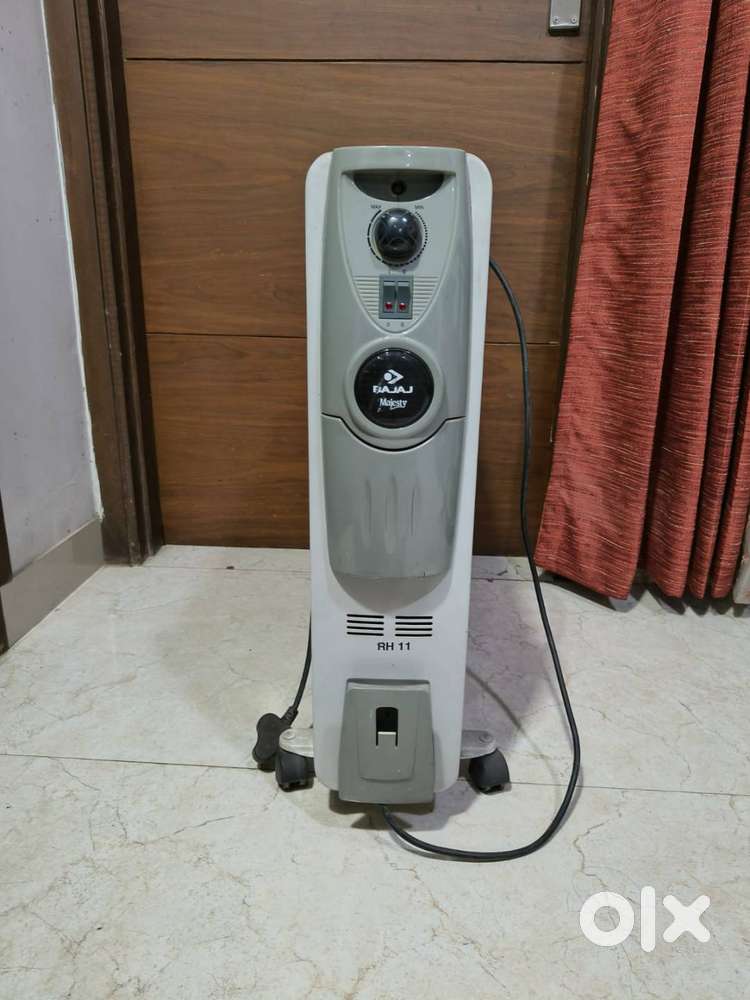 BAJAJ 11 Straight Fins, 2500 Watts Oil Filled Rediator Room Heater