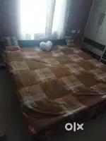 Double bed with mattresses
