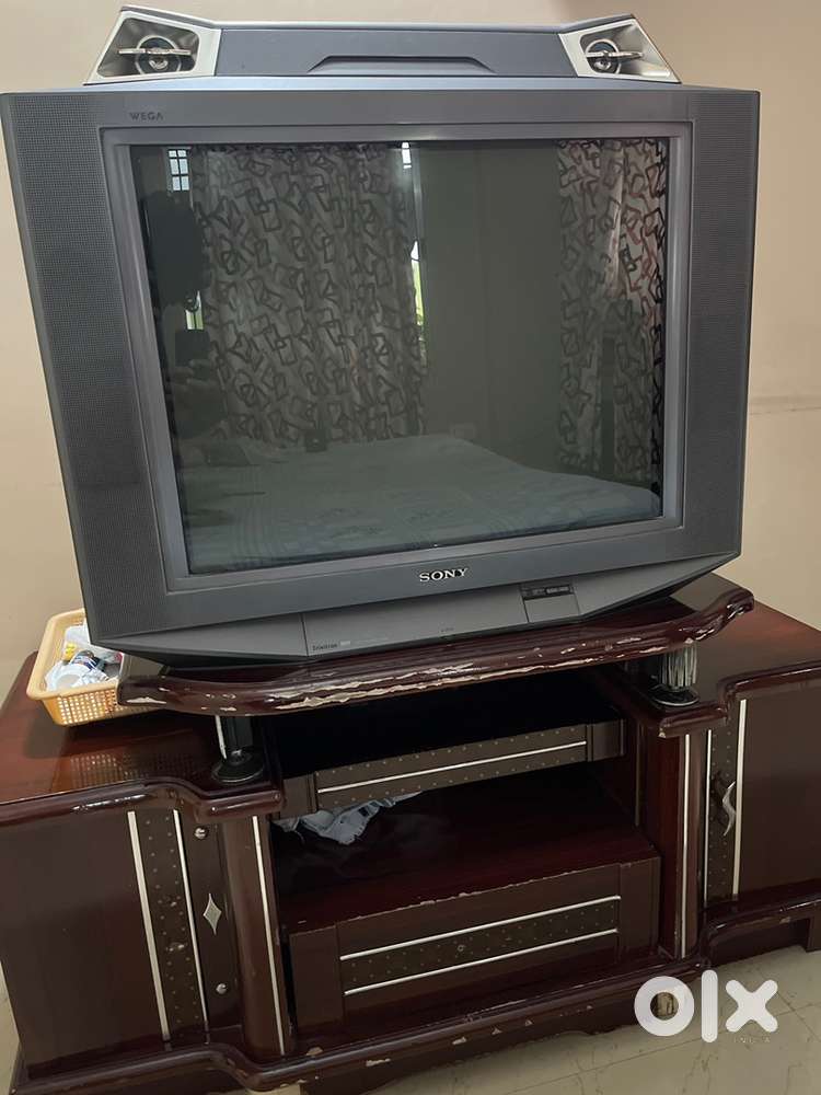 Sony trinitron color Tv ( Wega series) with 4 Way speaker & Tv Unit.