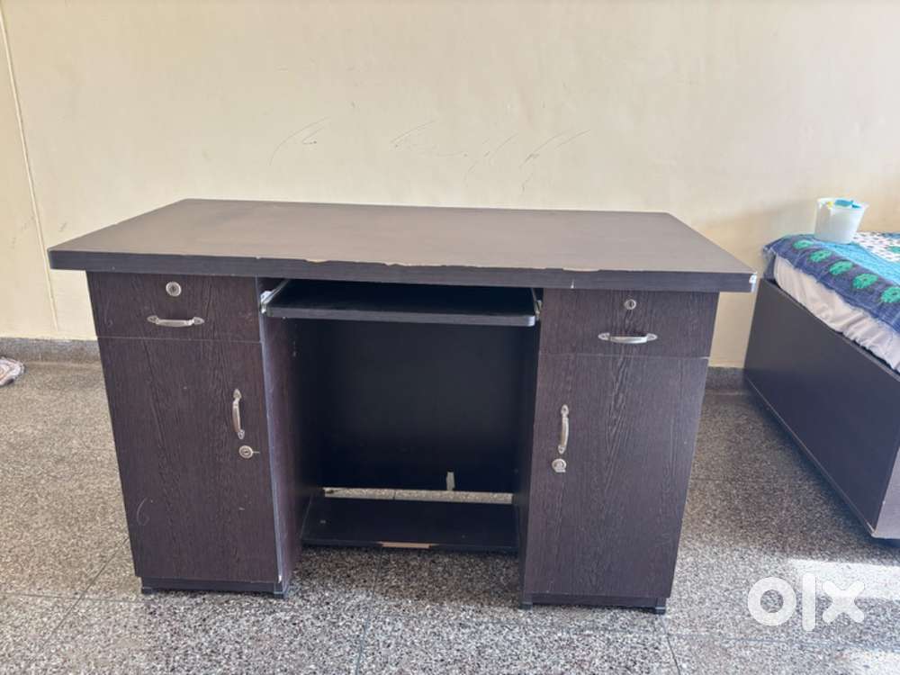 Large (4ft X 2ft) multi-purpose desk with two drawers and cabinets