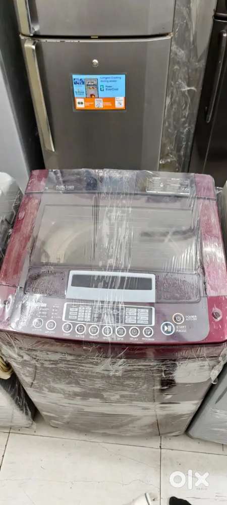 LG washing machine fully automatic top load with warranty and good con