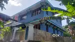 5 cents with 2000 sq feet double storeyed building at cheruvaikkal