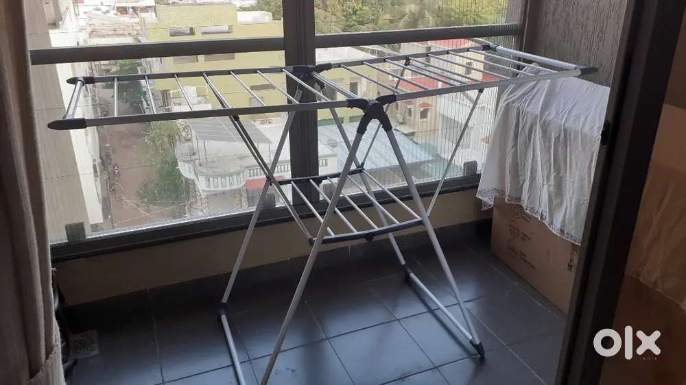 Stand for hanging washed clothes