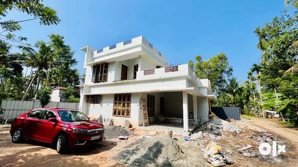 7 cent plot with 1800 sqft New model house in cherthala town