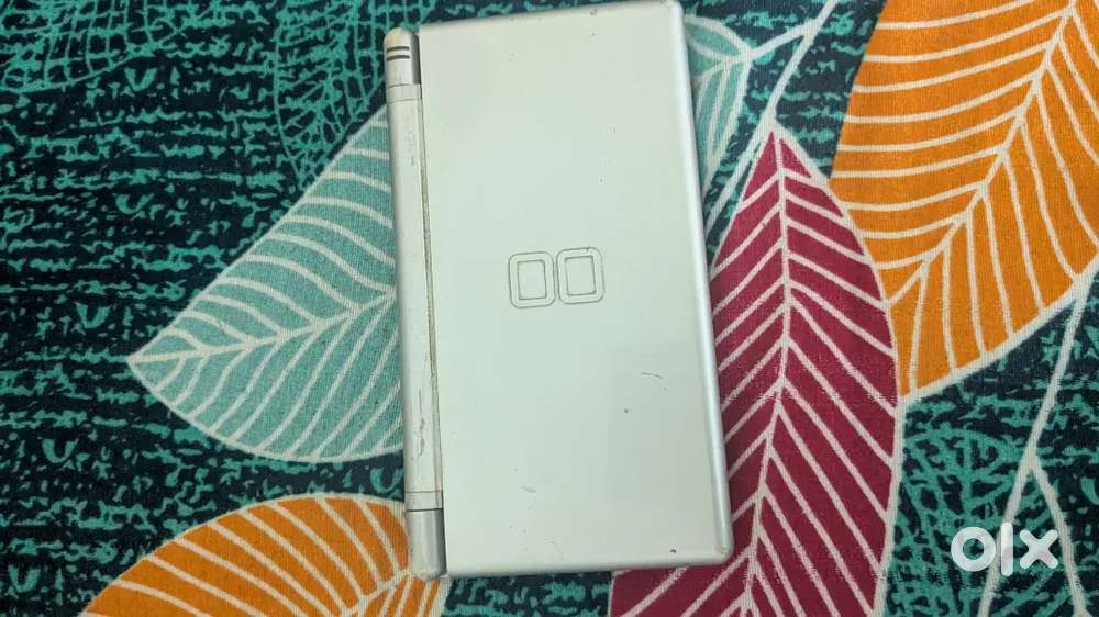 Nintendo ds lite with all accessories and a game.