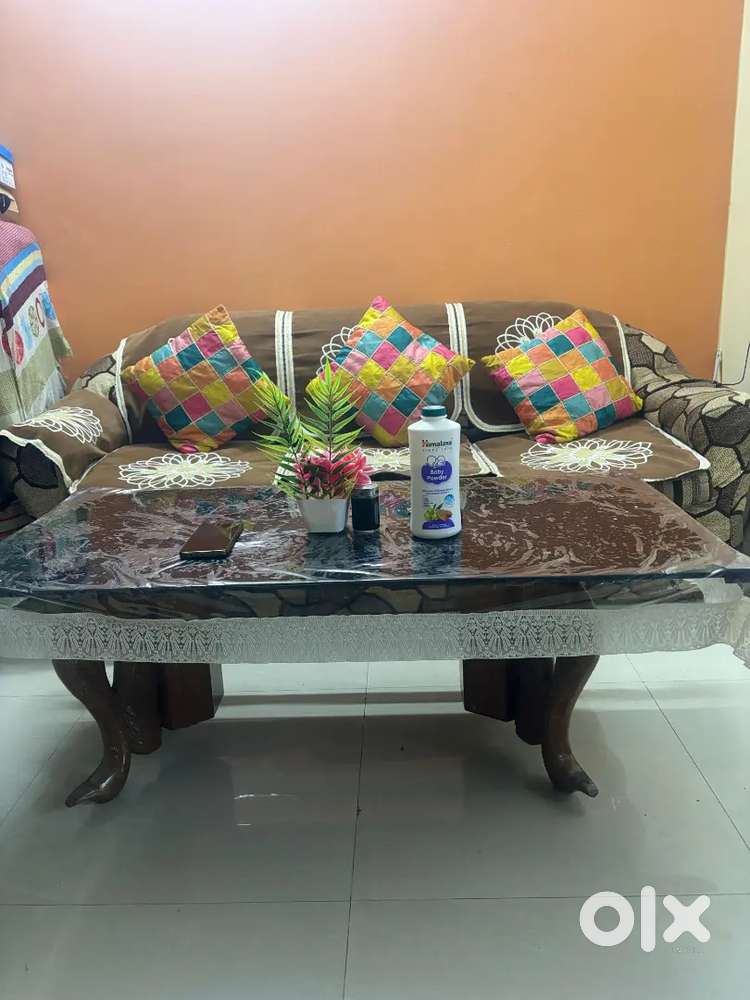 3 seater and 2 single seater in a sofa and center table also