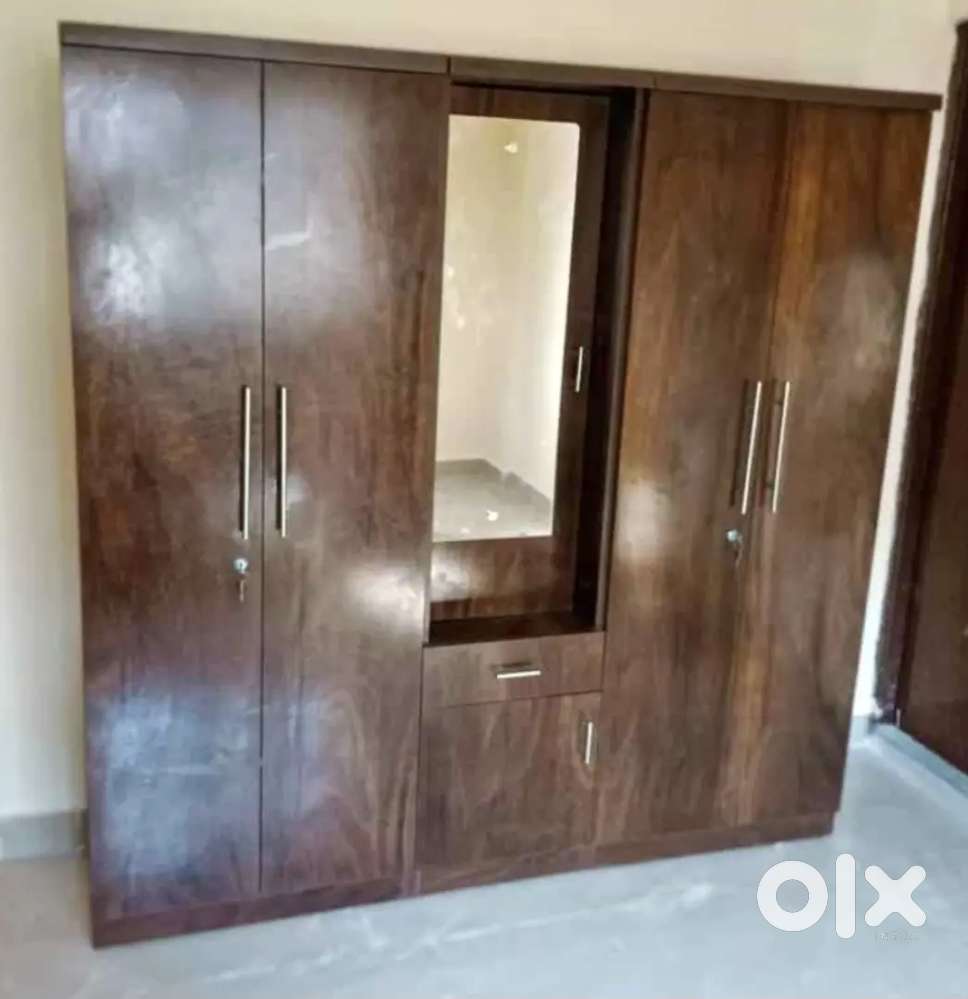 BRAND NEW 5 door wardrobe..