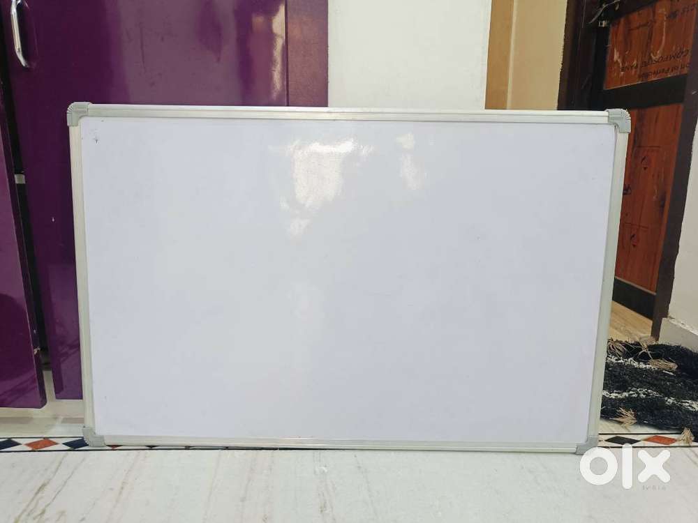 White and green board  Marker/chalk both use