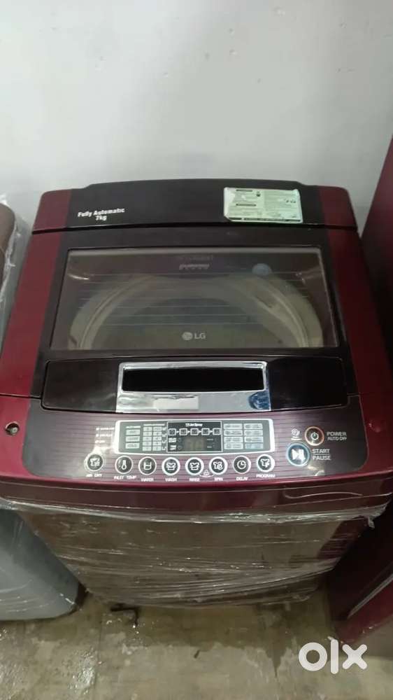 LG washing machine fully automatic top load with warranty 1 year old