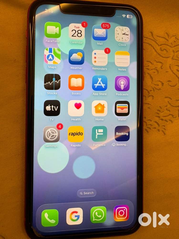 Iphone 11 with latest ios 26 (red color)