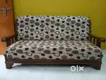 Wooden sofa set with table glass top.