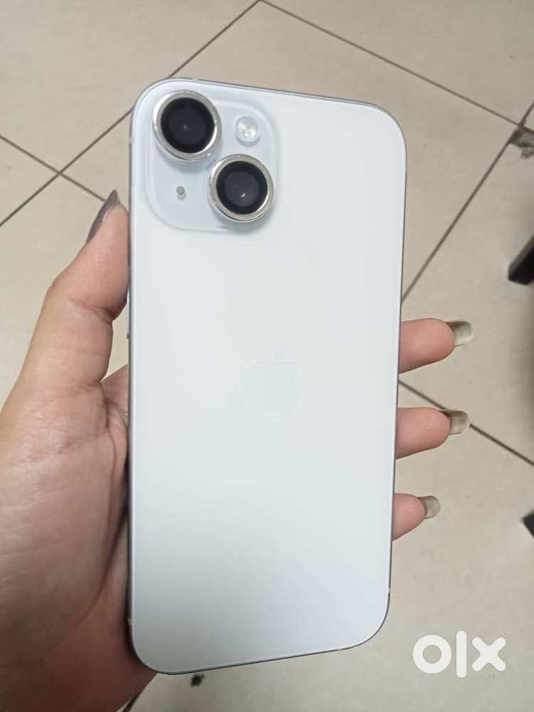 Selling my 4 months old I phone 1 5 in white colour/.Need urgent money