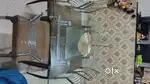 Almost brand new Dinning table with two glass and 6 chair