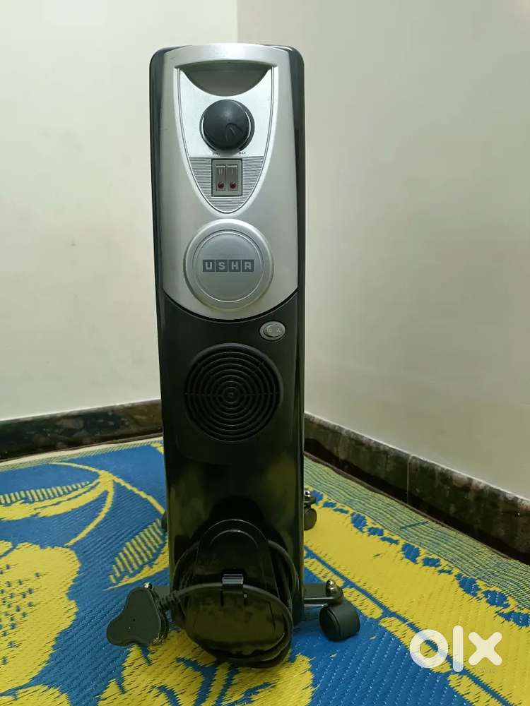 USHA OFR 9 FIN 2400 Watts PTC Room Heater with fan