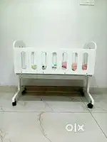 LESS USED CLEAN AND NEAT BABY CRADLE  / COT WITH MOSQUITO NET