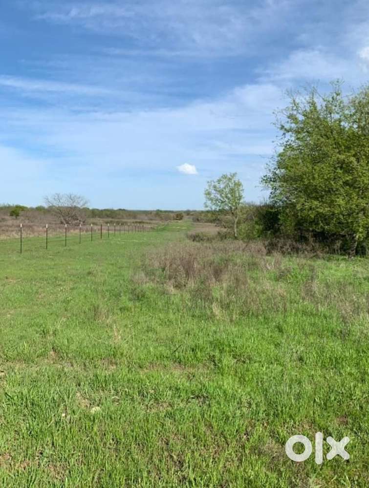 Plot for sale. Area - 16,000 sq feet. Located on main road.