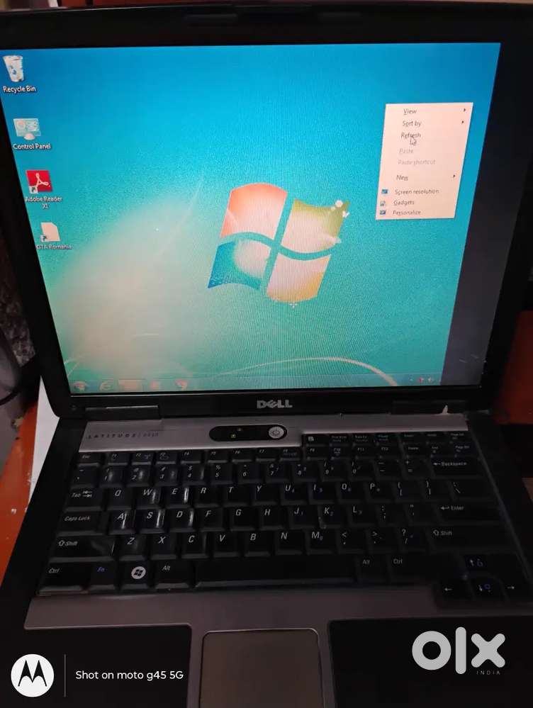 1 inch kala ho gya hy Battery bhi nhi hy cargar hy