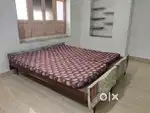 Wooden Double bed with mattress