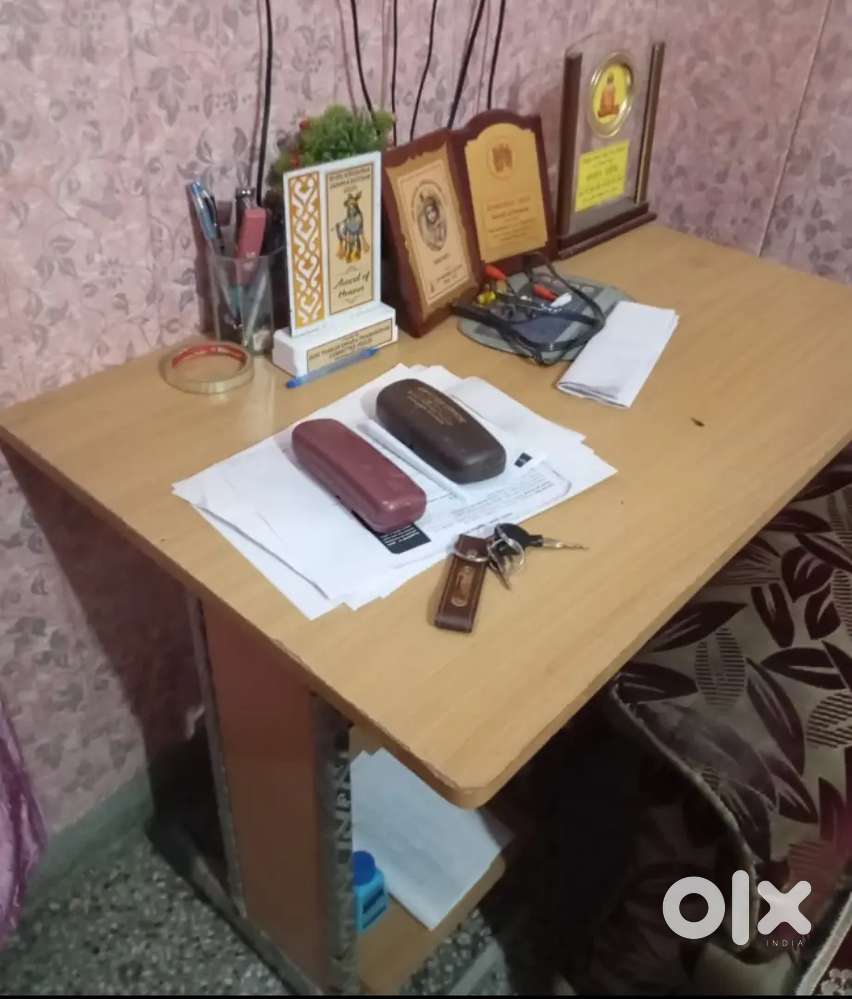 Five seater sofa and unused computer table