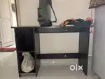 Table and movable chair