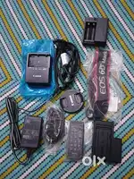 Original battery charger, nx 100 charger & remote,cap,  cell charger.