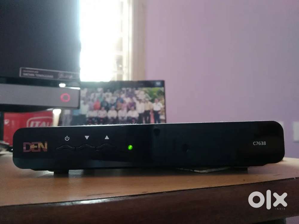 Den Setup box with remote and adapter